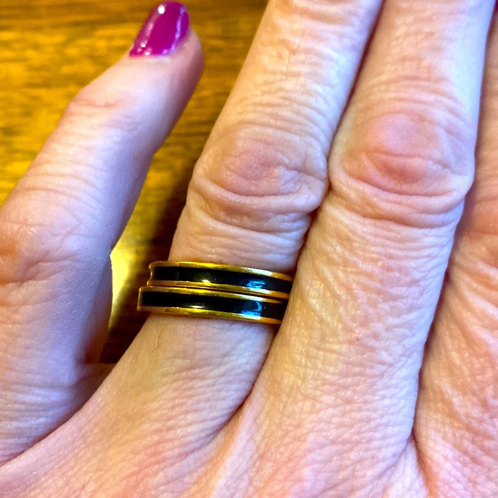 Two slim band stackable rings from Joan Rivers with black enamel and gold tone